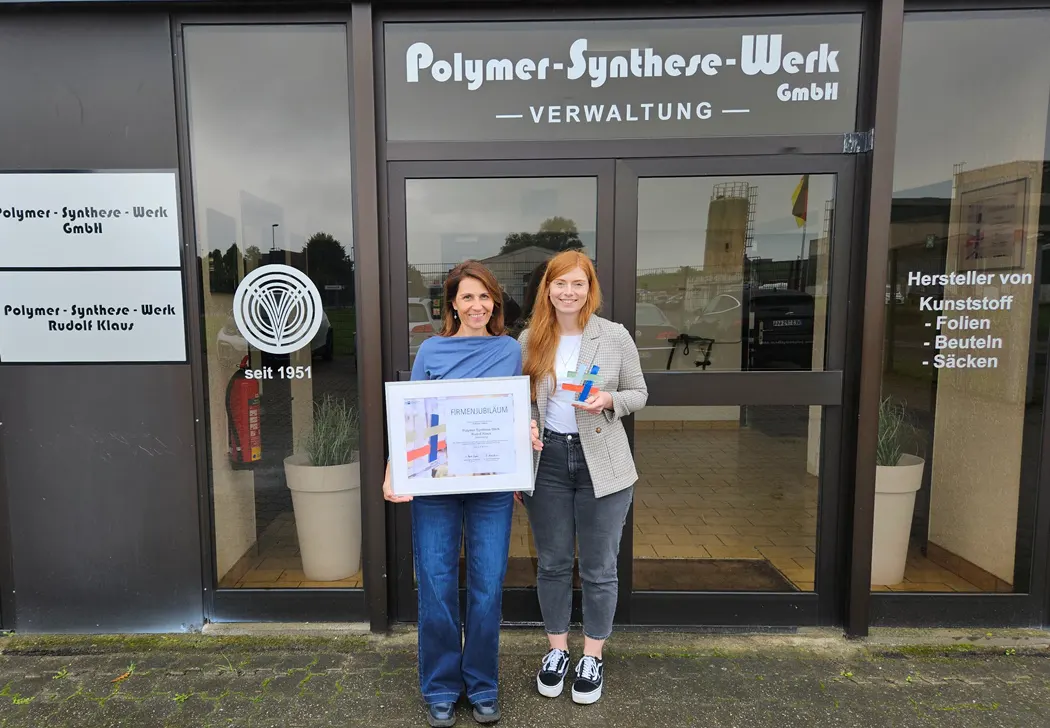 Presentation of anniversary certificate to Christiane Klaus Presentation of anniversary certificate
